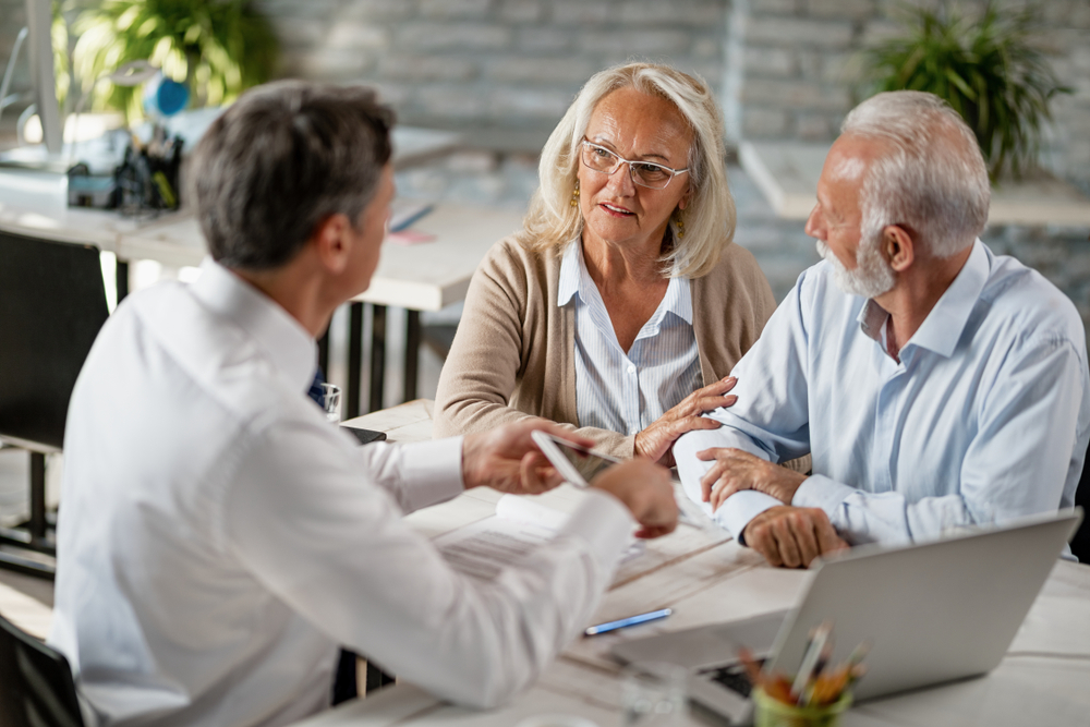 A senior couple discussing for retirement planning at AM Planning
